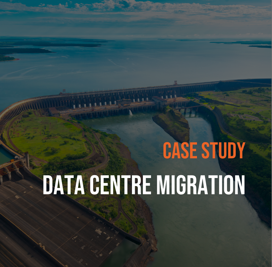 Aerial image of a hydroelectric dam and river featured in a data centre migration case study.
