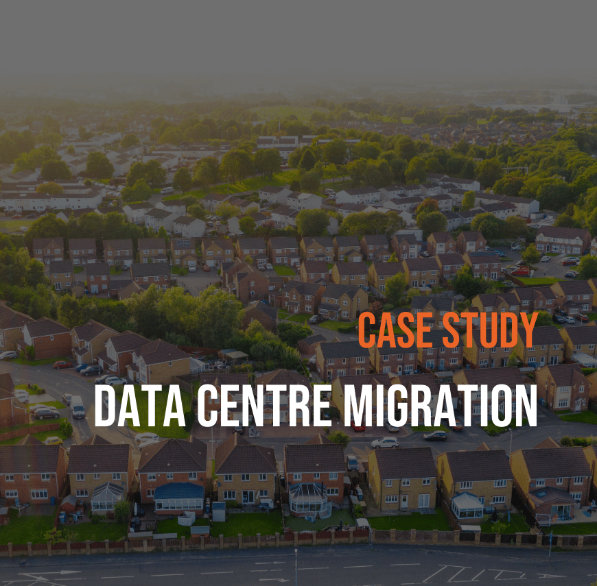 Aerial view of a UK residential area with homes and green spaces, overlaid with text reading “Case Study: Data Centre Migration”.